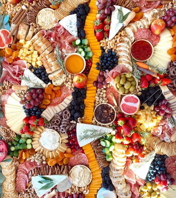 overhead view of large charcuterie grazing table